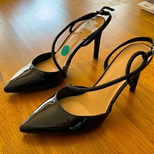 New with tags. Patent Leather pumps. Size 7.5.